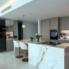 Modern Kitchen with Marble Countertops & Elegant Storage In Dubai Marina