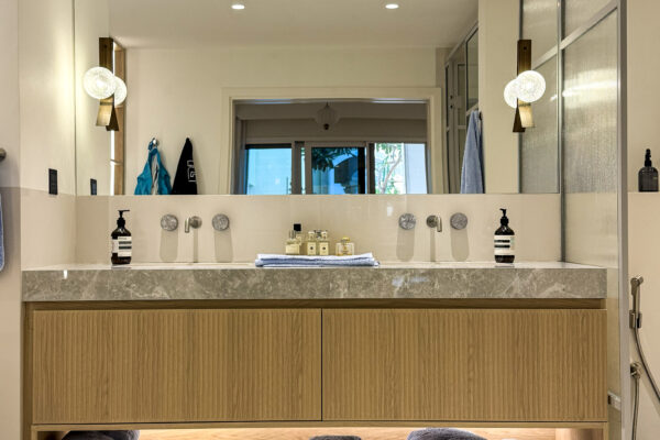 Custom Floating Vanity | Double-Sink Cabinetry & Ambient Under-Cabinet Lighting