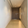 Architectural Corridor Design | Full-Height Oak Doors & Integrated Wall Lighting