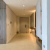 Luxury Apartment Entryway | Minimalist Wood Paneling & Backlit Mirror Console