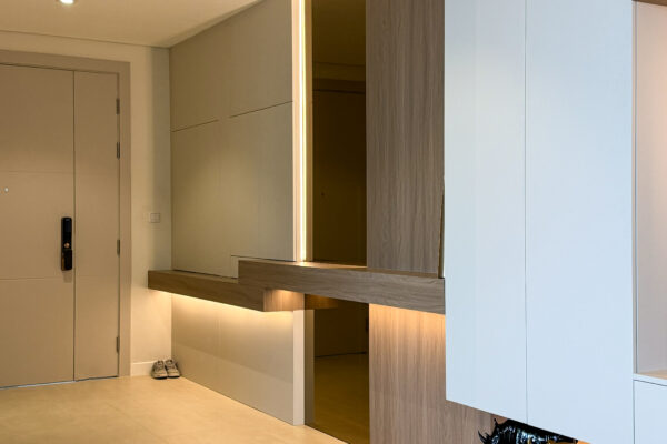 Alternative view of Luxury Apartment Entryway | Minimalist Wood Paneling & Backlit Mirror Console
