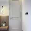 Classic Contemporary Interior Door | Fluted Wood Slat Wall & Accent Lighting