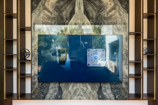 Alternative view of Luxury TV Feature Wall | Bookmatched Marble Accent & Hidden Storage Joinery