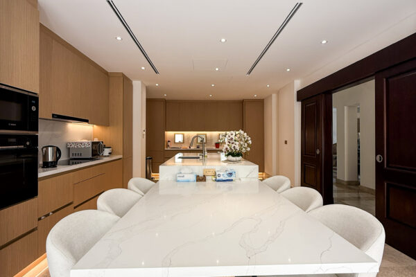 Integrated Kitchen Island & Dining Table | Elegant Oak Cabinets & Marble Floors