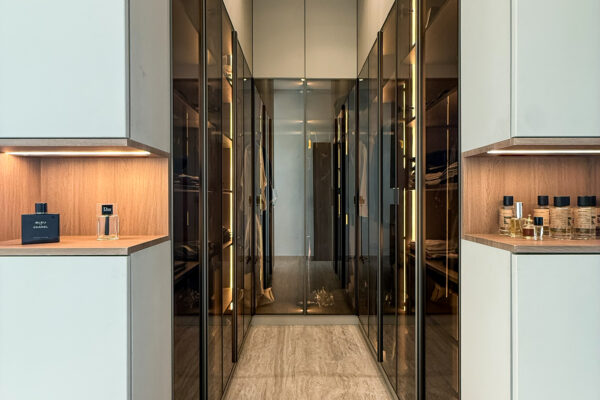 Luxury Walk-In Closet Layout | Tinted Glass Wardrobes & Integrated LED Lighting