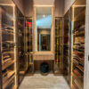 Luxury Walk-In Closet Layout | Tinted Glass Wardrobes & Integrated LED Lighting