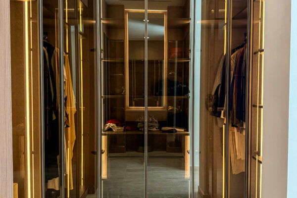 Alternative view of Luxury Walk-In Closet Layout  Tinted Glass Wardrobes & Integrated LED Lighting