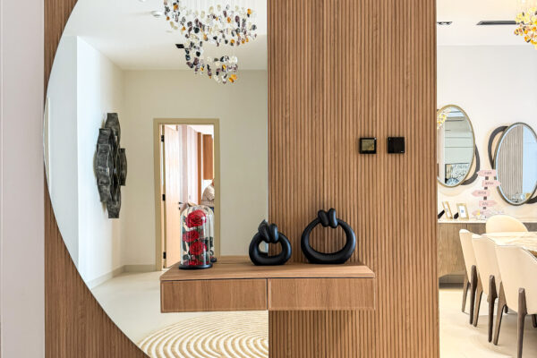 Modern Luxury Foyer & Coffee Station | Curved Wood Joinery & Arch Mirror