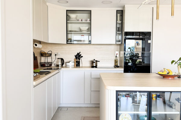 Alternative view of Modern Bright Kitchen Architecture | Glass-Front Island & Pocket Door Pantry