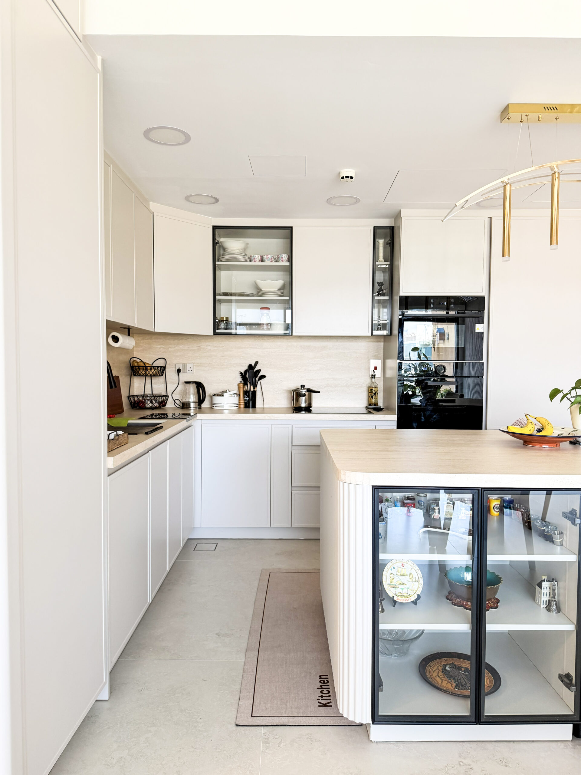 Modern Bright Kitchen Architecture | Glass-Front Island & Pocket Door Pantry 3 Modern Bright Kitchen Architecture | Glass-Front Island & Pocket Door Pantry - Image 2